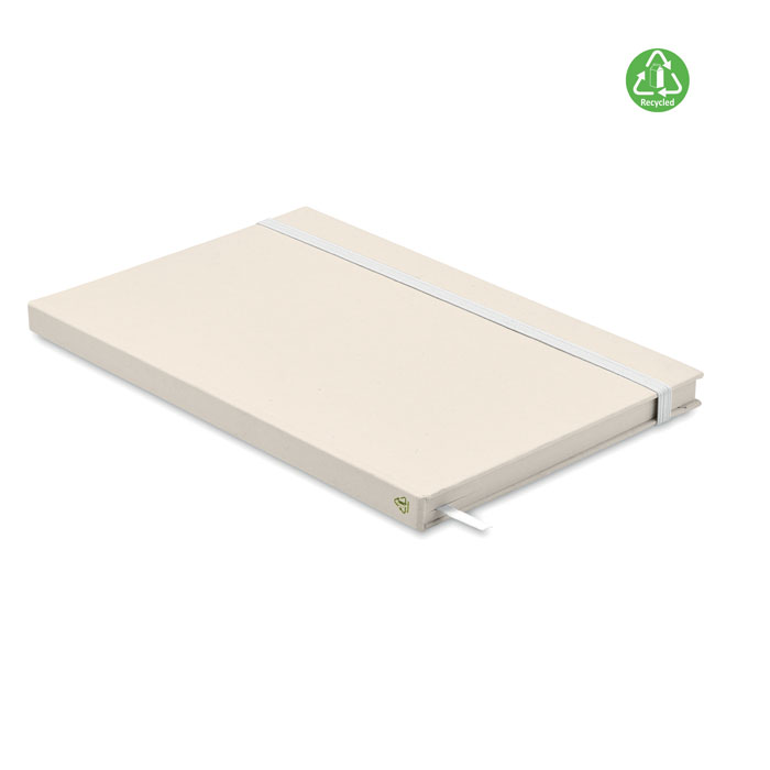 Zeszyt A5 karton z recyklingu Zeszyt A5 z twardą okładką i 160 stronami w linie (80 kartek 80 g/m²) wykonany w 70% z kartonów po mleku i w 30% z papieru z recyklingu. Elastyczny pasek zamykający, zakładka z tasiemki.