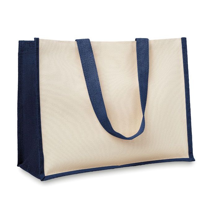 Torba na zakupy Jutowa torba na zakupy, wewnątrz laminowana, z zewnątrz płócienna. Posiada długie, bawełniane uchwyty. Ten produkt posiada certyfikat OEKO-TEX® STANDARD 100.