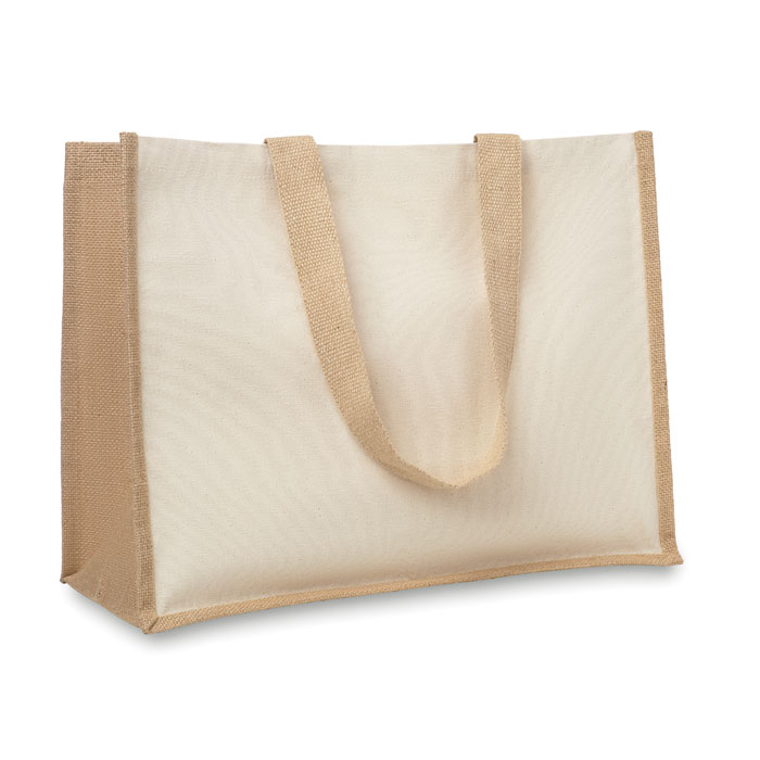 Torba na zakupy Jutowa torba na zakupy, wewnątrz laminowana, z zewnątrz płócienna. Posiada długie, bawełniane uchwyty. Ten produkt posiada certyfikat OEKO-TEX® STANDARD 100.