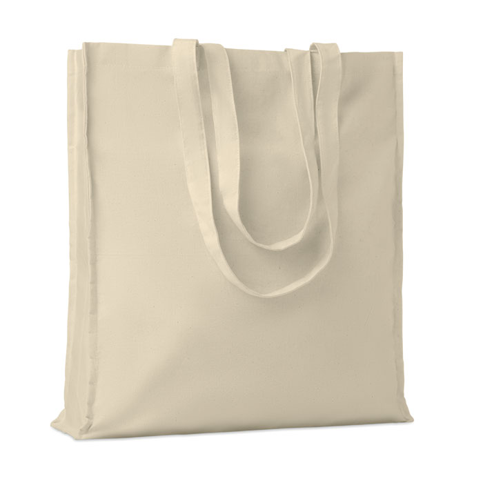 Bawełniana torba na zakupy Bawełniana torba na zakupy z długimi uchwytami 140 gr / m². Ten produkt posiada certyfikat OEKO-TEX® STANDARD 100.