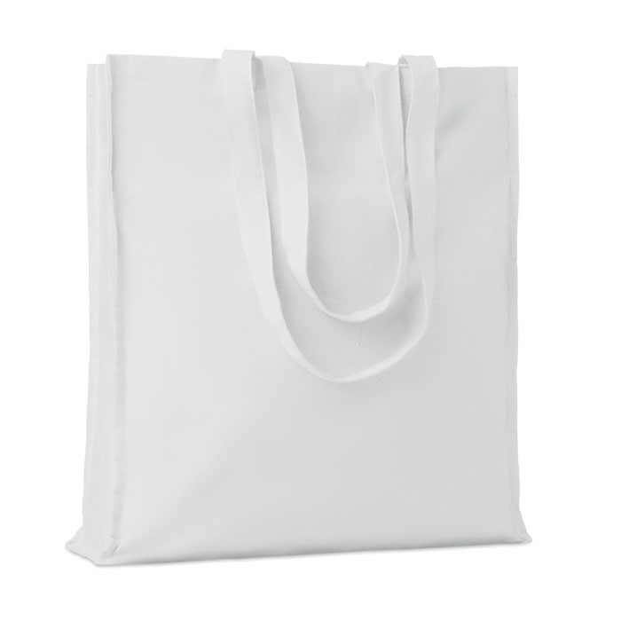 Bawełniana torba na zakupy Bawełniana torba na zakupy z długimi uchwytami. 140 gr / m². Ten produkt posiada certyfikat OEKO-TEX® STANDARD 100.